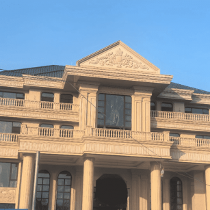 漳州黄金麻别墅外墙干挂石材效果示例