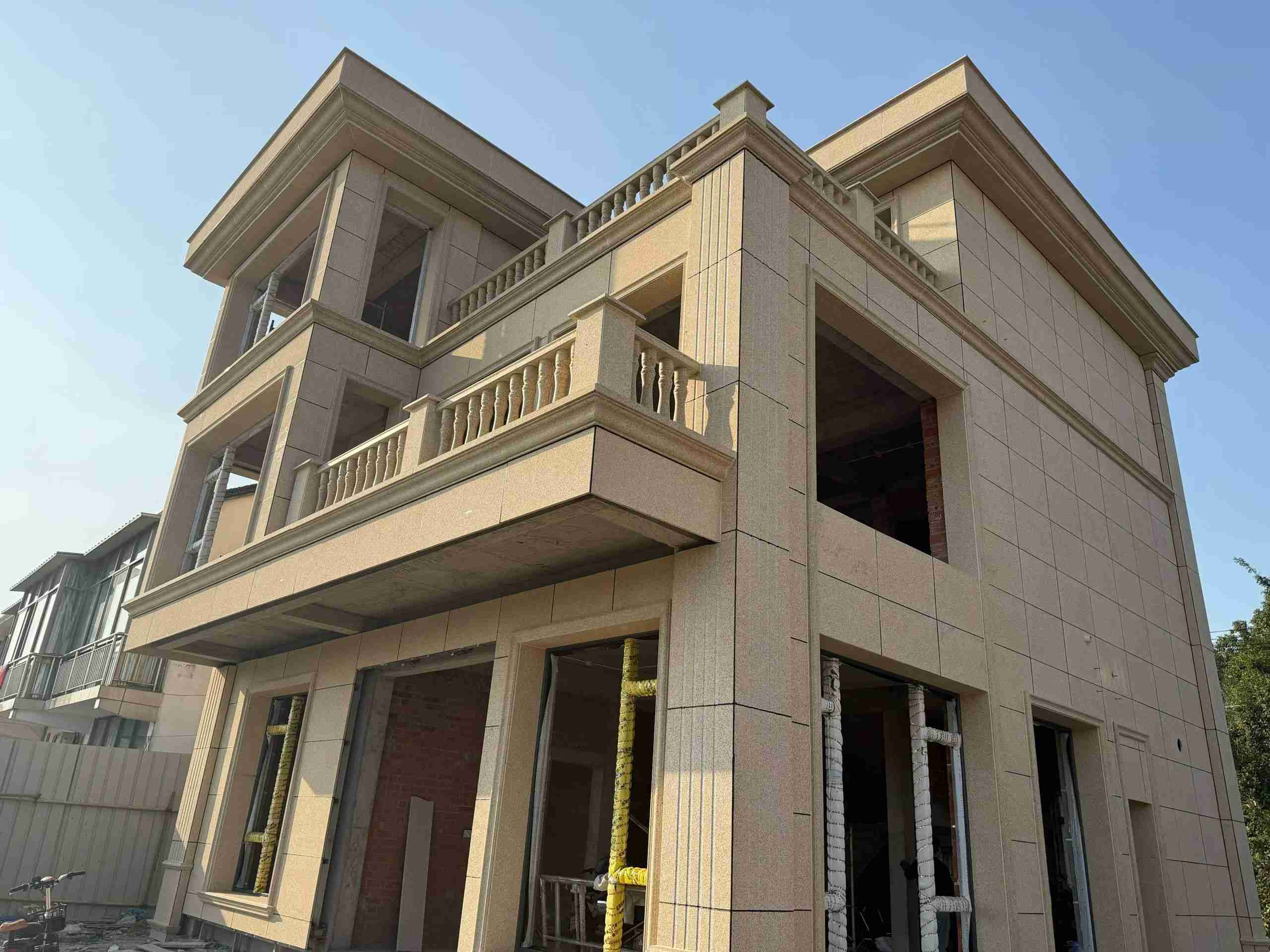 漳州 黄金麻花岗岩石材荔枝面外墙干挂效果展示